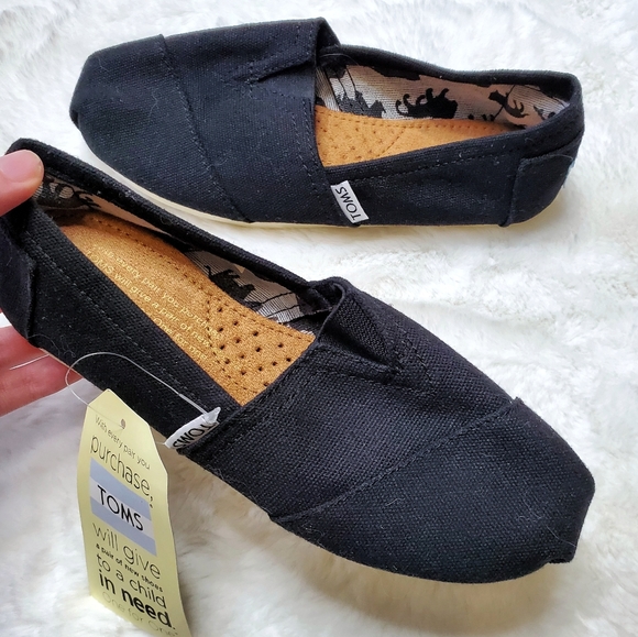 Toms Shoes - (SOLD) TOMS Animal Print Canvas Slip ons